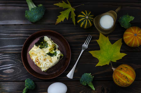Healthy cabbage casserole at wooden table, still life, rustic styleの写真素材