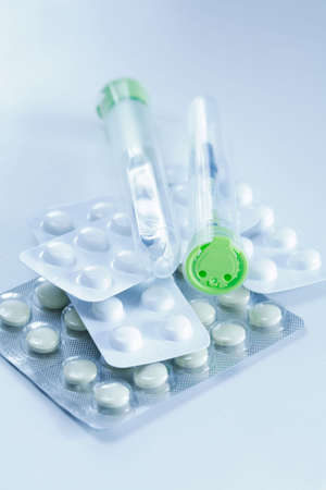 Injections and pills in blue toneの写真素材