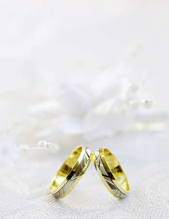 wedding rings on the white background の写真素材
