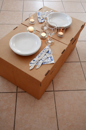 Moving into new home, first evening in new place without furnitureの写真素材