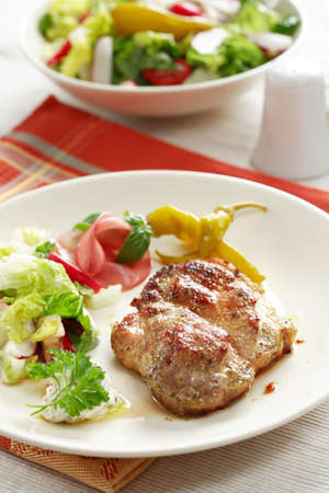 Steak with vegetable saladの写真素材