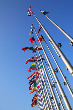 Flags of European states against blue skyの写真素材