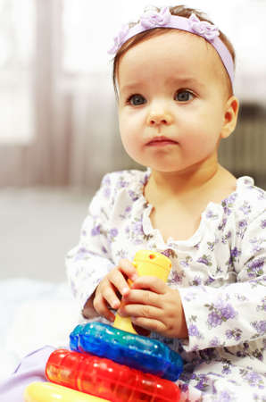Baby plays with toysの写真素材