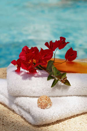 Towels by swimming pool, concept of recreation and holidayの写真素材