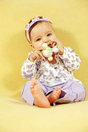 Cute baby with toyの写真素材