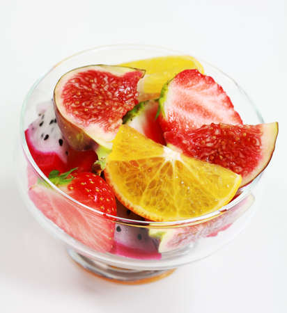 Delicious fresh fruits in bowl as dessertの写真素材