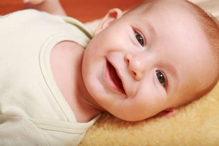 Cute baby smilingの写真素材