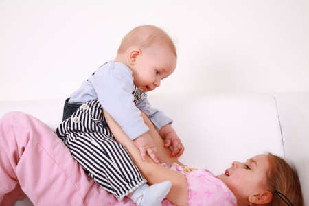 Adorable kids playing playing togetherの写真素材