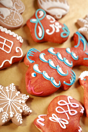 Detail of delicious Christmas gingerbread on baking paper