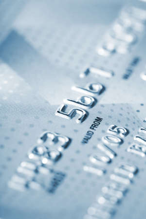 Detail of credit card as background in blue toneの写真素材