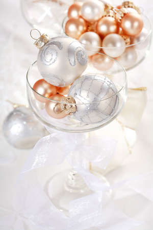 Detail of Christmas balls with candles in red toneの写真素材