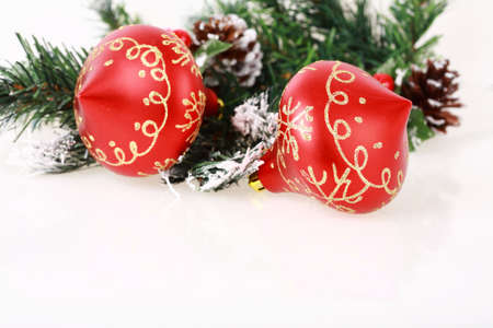 Christmas decoration with red balls on white background with copyspace for your textの写真素材