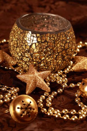 Still life with candlelight for Christmas in golden anf brown toneの写真素材