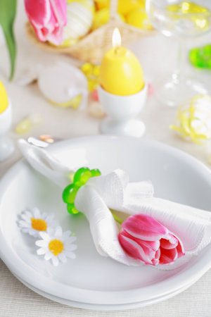 Place seeting for Easter in fresh colors
