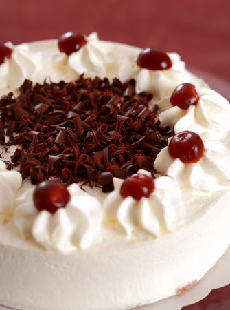 Piece of delicious sweet cake garnished with fruist