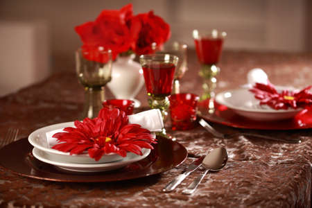 Luxury place setting in red and white  for Christmas or other eventの写真素材