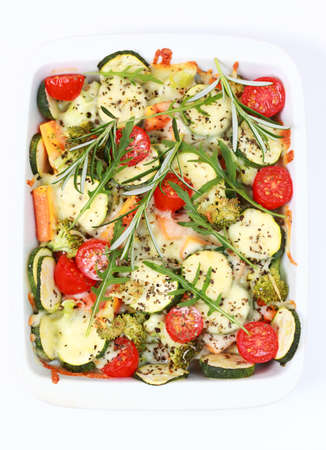 Baked mixed vegetable with cheese and herbsの写真素材