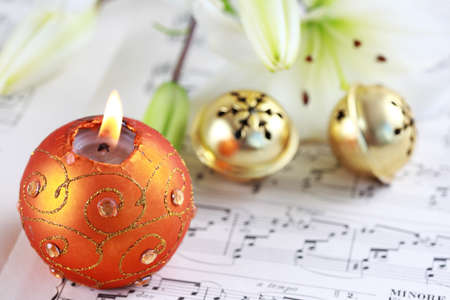 Christmas still life with jingle bells and music notesの写真素材