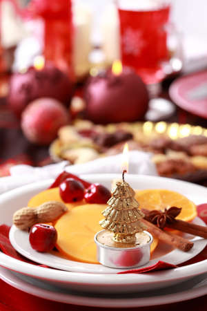 Place setting for Christmas with fresh fruitsの写真素材