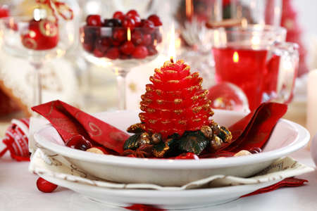 Table setting for Christmas with fresh fruitsの写真素材