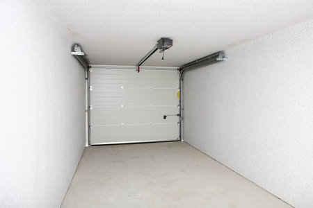 Empty garage or warehouse with closed door