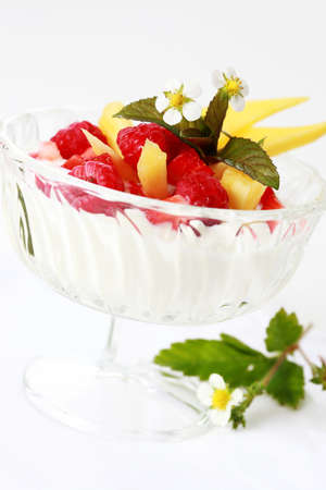 Natural yogurt with fresh fruits for breakfast or as dessertの写真素材