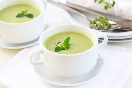 Broccoli soup with fresh herbsの写真素材