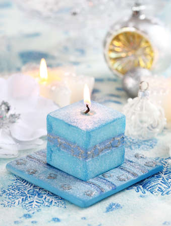 Christmas still life with candles and white and blue toneの写真素材
