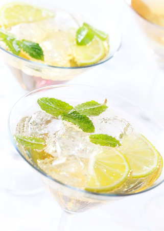 Cocktails or longdrinks garnished with fruitsの写真素材