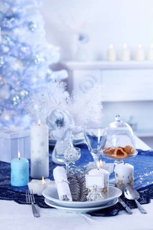 Place setting for Christmas in blue and white toneの写真素材