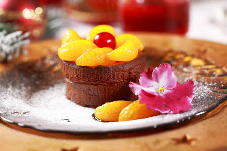 Chocolate Cup Cake for Christmas with caramelized fruitsの写真素材