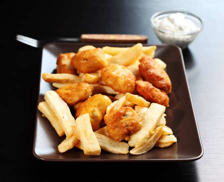 Fried fish and chips with remouladeの写真素材