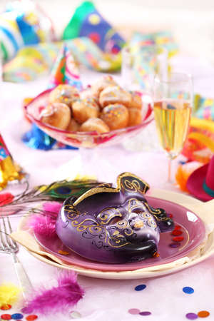 Carnival and party place setting with maskの写真素材