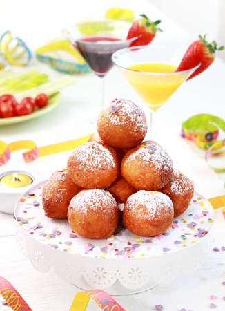 Small fried doughnut with cocktails for carnivalの写真素材