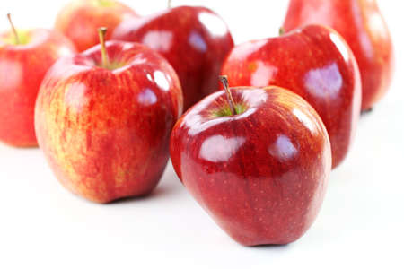 Delicious red aplles on white backgroundの写真素材