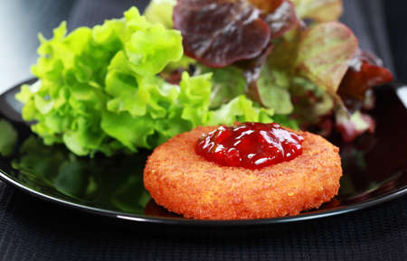 Baked Camembert with Cranberry Sauce and mixed saladの写真素材