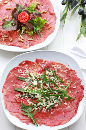 Carpaccio with rocket and cheesseの写真素材