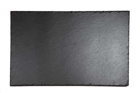 Black shale plate on white backgroundの写真素材