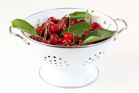 Fresh cherries in the bowlの写真素材