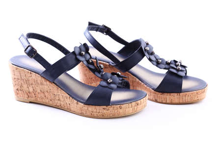 Blue summer shoes on white backgroundの写真素材