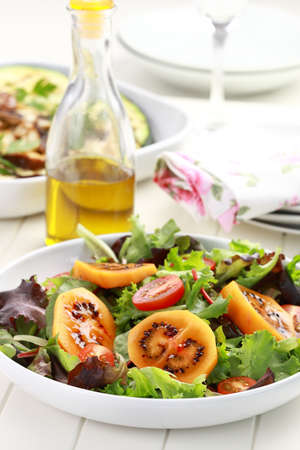 Salad with tamarillos and olive oilの写真素材