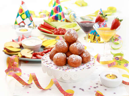Small fried doughnut with cocktails for carnivalの写真素材