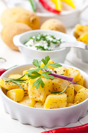 Delicious baked potatoes with sour cream の写真素材