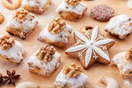 Assortment of Christmas cookies on the wooden boardの写真素材