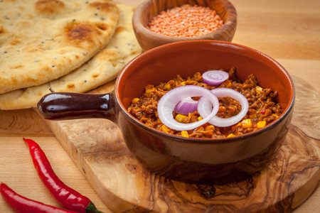 Mexican chilli con carne with red lentils and flatbread