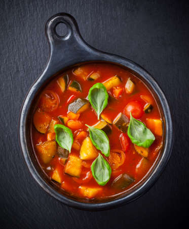 Homemade delicious minestrone soup with basilの写真素材