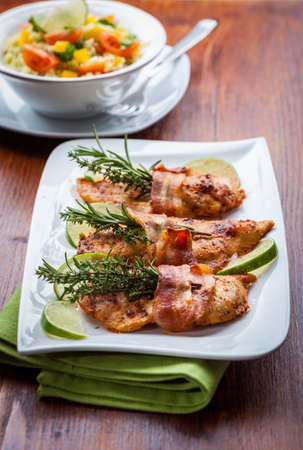 Chicken breast with herbs and couscous saladの写真素材