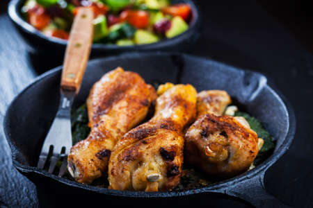 Crispy chicken legs in a panの写真素材