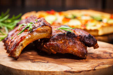 BBQ spare ribs with herbsの写真素材