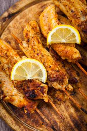 Grilled chicken skewers with lemon marinadeの写真素材